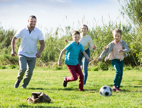 Family enjoying soccer