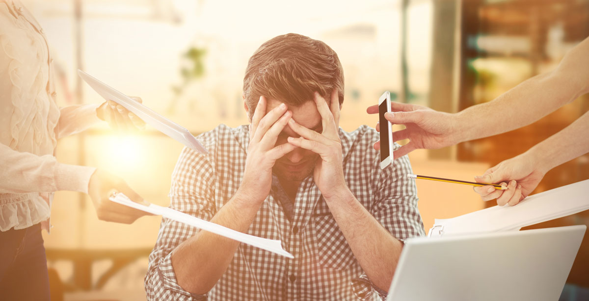 Businessman stressed out at company