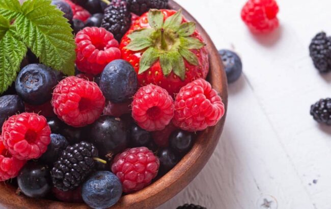 Berries are high in fiber, which can help lower cholesterol.